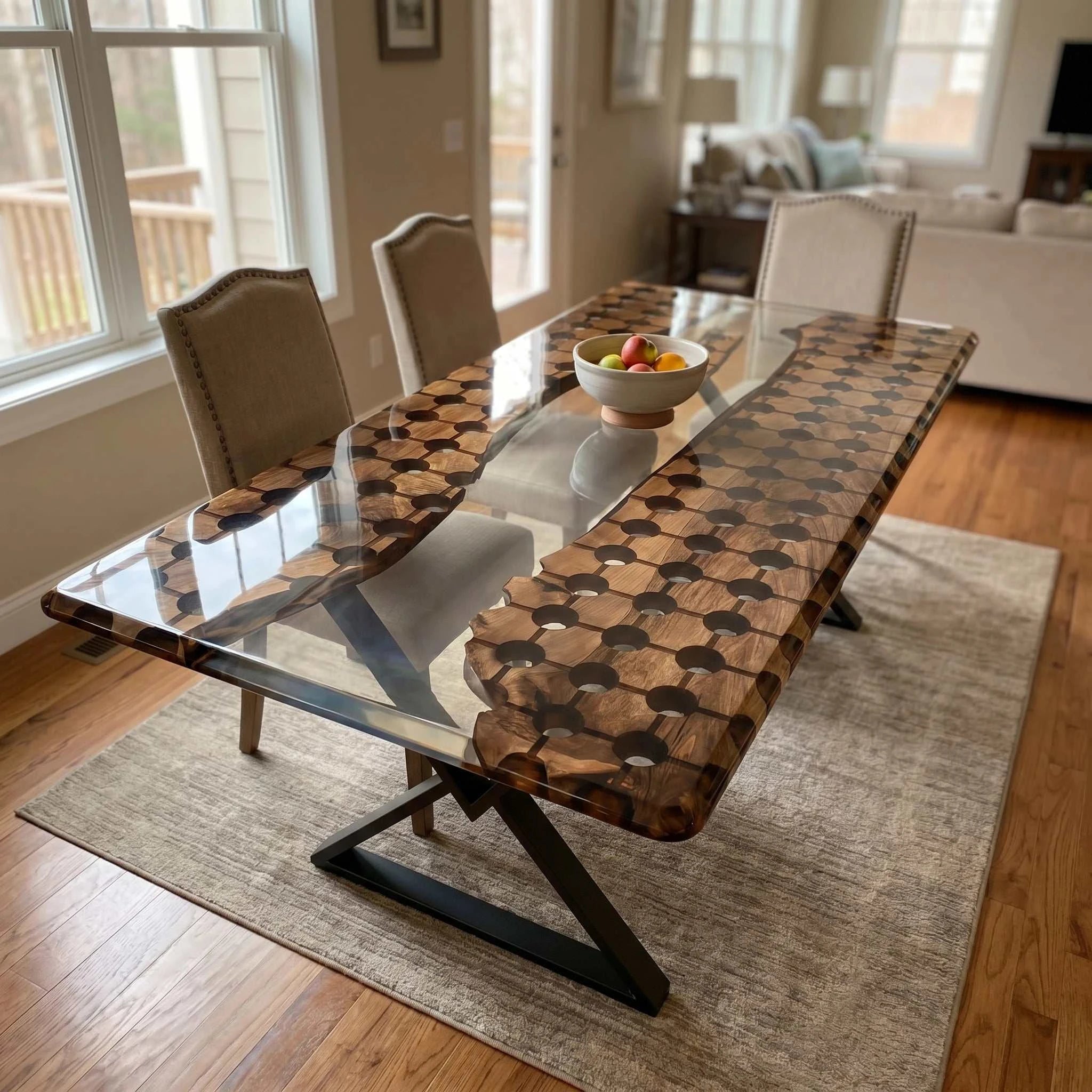 Walnut conference table with geometric circular cutouts, clear resin river, floating wood island, and black metal legs.