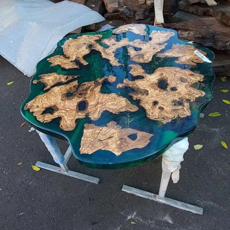 Lagoon Olive Round Dining Table with olive burl wood and turquoise resin on dark metal pedestal base