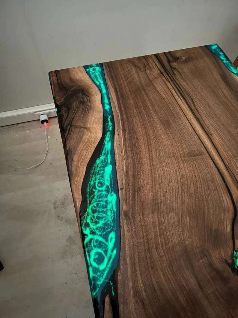 Aurora Glow Dining Table with glowing turquoise phosphorus resin and walnut wood slab