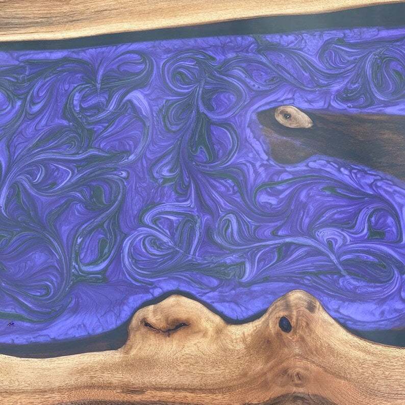 Large live-edge Amethyst River Walnut Dining Table with purple matte resin river and black metal X-base