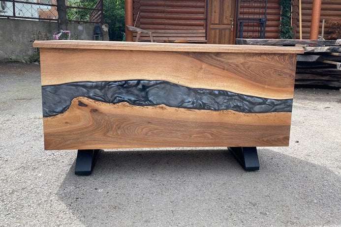 Storm Walnut Storage Bench with swirling gray resin on walnut wood and black metal legs