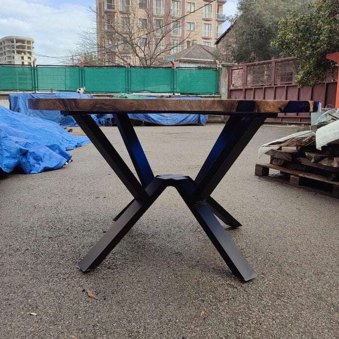Sapphire Burl Round Dining Table with walnut burl wood and blue resin on black metal base