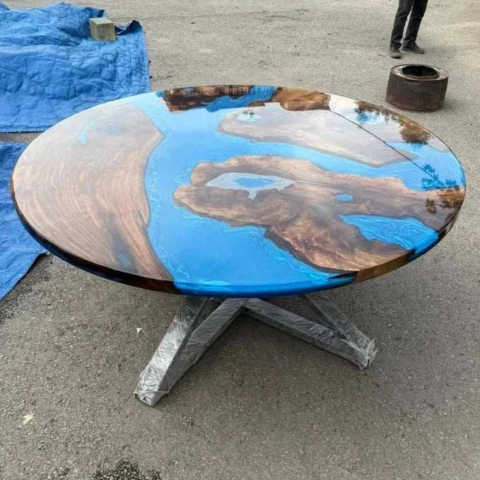 Constellation Round Dining Table with walnut wood and metallic blue resin channels on black steel geometric base