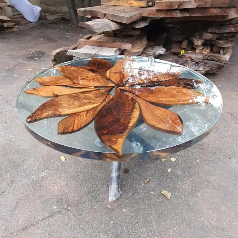Sunburst Walnut Round Dining Table with clear epoxy resin and single pedestal base