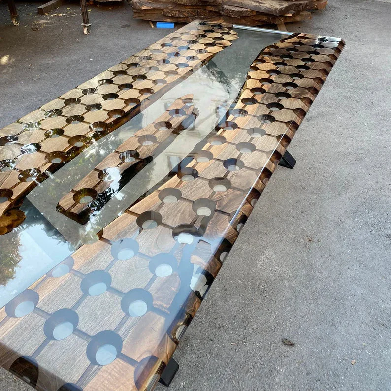 Modern walnut conference table with geometric circular cutouts and clear resin river centerpiece