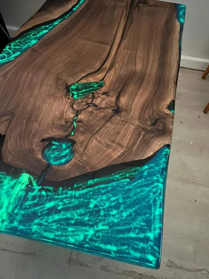 Aurora Glow Dining Table with walnut wood and glowing turquoise phosphorus resin edges