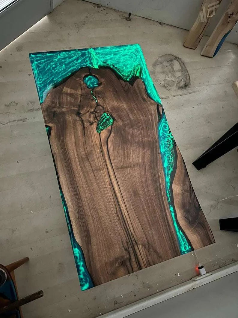 Walnut Aurora Glow Dining Table with turquoise glowing resin and live edge slab