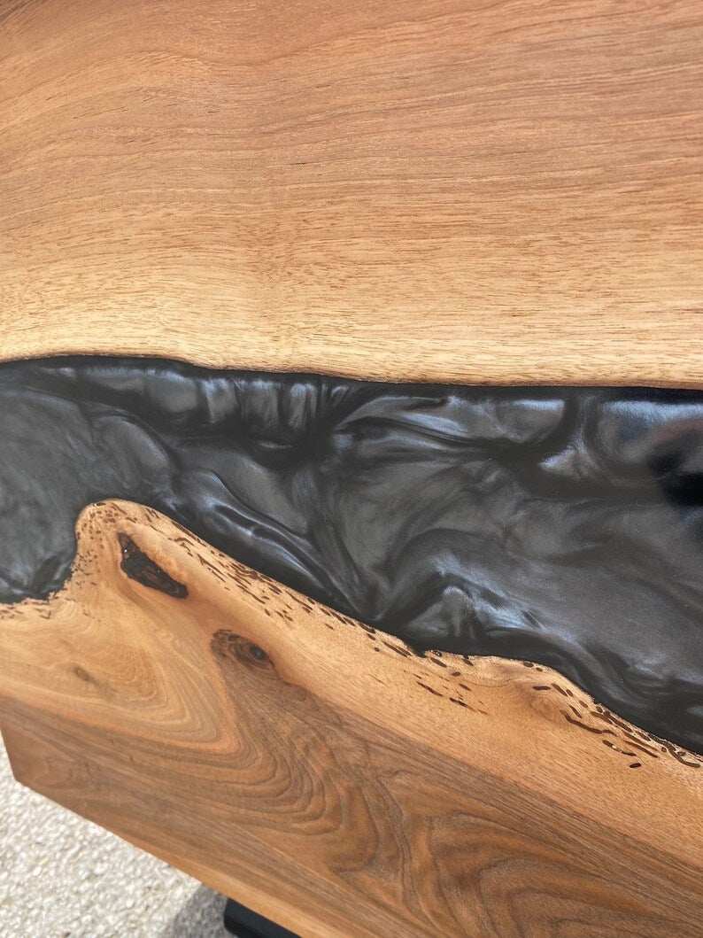 Storm walnut storage bench with swirling gray resin river, solid walnut wood, and black metal legs