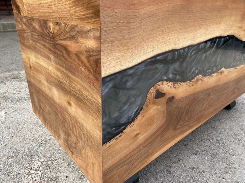 Storm Walnut Storage Bench with swirling gray resin river on walnut wood and black metal legs