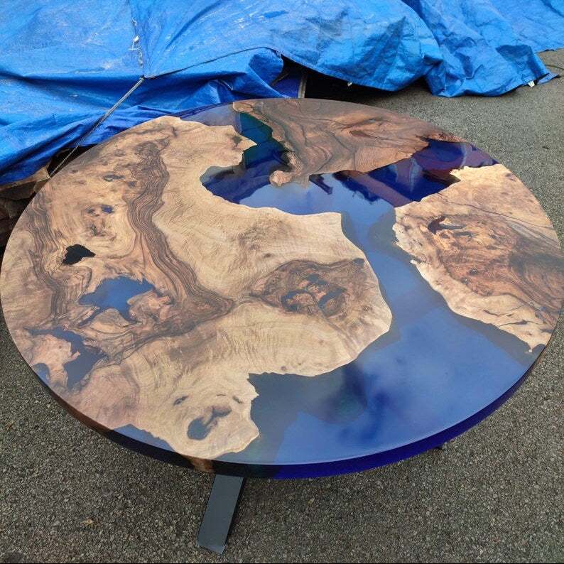 Sapphire Burl Round Dining Table with walnut burl wood and blue resin on black metal base
